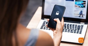 Woman holding a phone that is locked